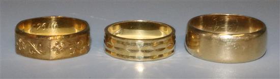 2 x 18ct gold bands and 1 x 14ct gold band.